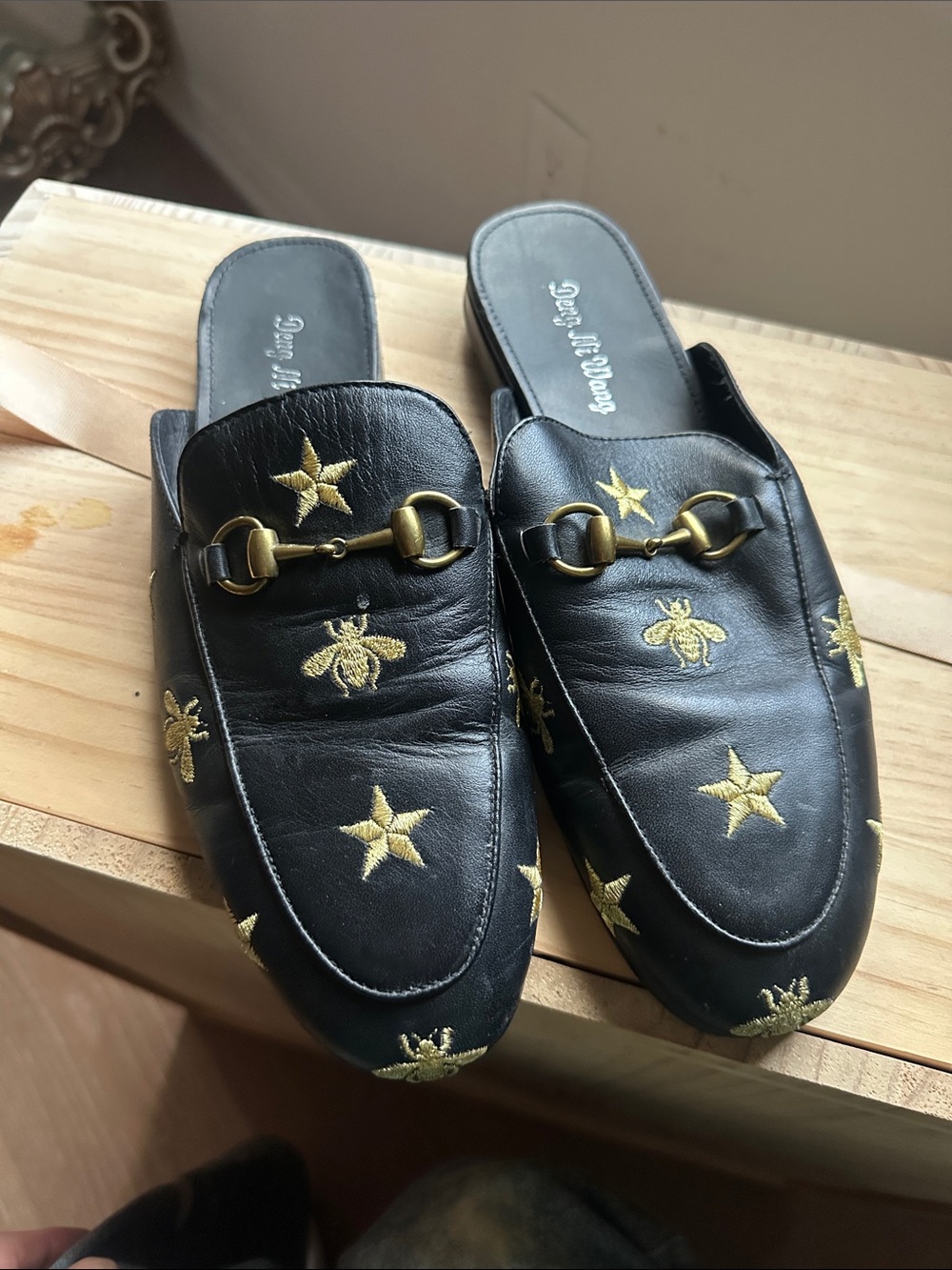 Black Leather Embroidered Slip-On Mules with Gold Accents